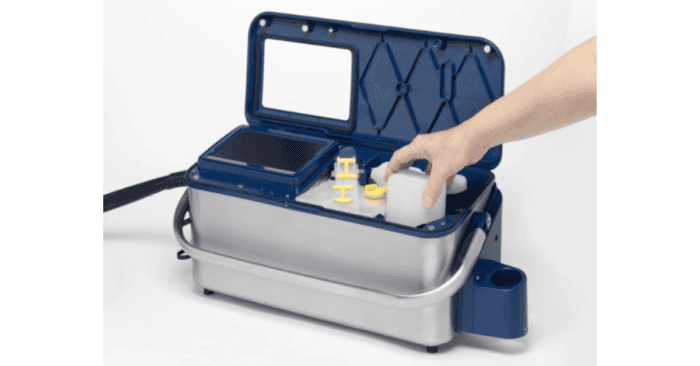 Portable industrial cleaning device with blue and white design for industrial use.
