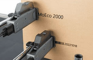 Cardboard packaging and sealing equipment for manufacturing and logistics operations.