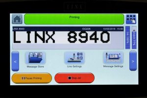 LINX 8940 industrial print controller display with printing settings and barcode preview.